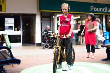 Boy on bike listening