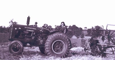 Rita Stokes on a tractor