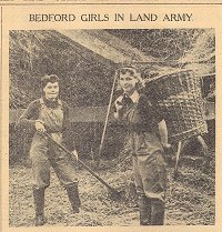 Pamela Edgeworth & Matilda Shaw in training, threshing at Large Farm, Dean 