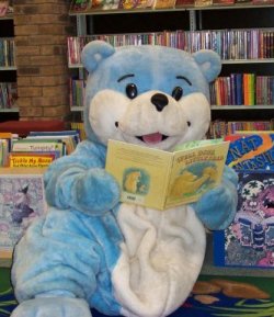 bookstart bear reads a book