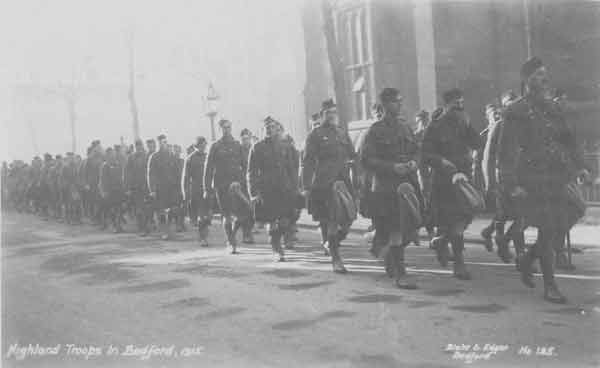 The 5th Seaforth Highlanders march past Bedford Modern School