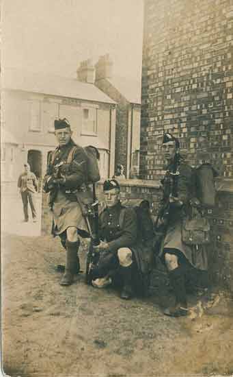 Black Watch Soldiers pose for the camera in Coventry Road
