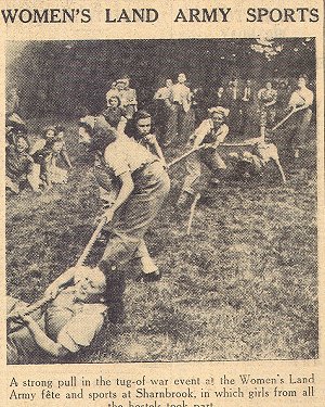 Land girls tug of war at Sharnbrook hostel, July 1945