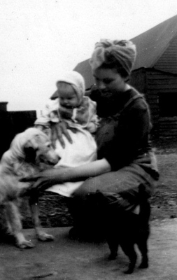 Joyce Harris, nee Malpass, with baby daughter Sandra at Simkins Farm, Lower Stondon.