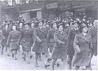 Close up of marching land girls
