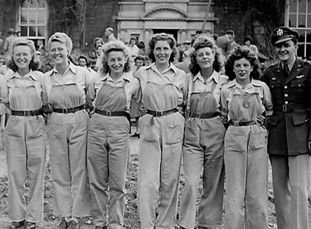 Sharnbrook land girls at the fete with Colonel Part, August 1945