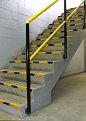 Staircase with safety tape on edges